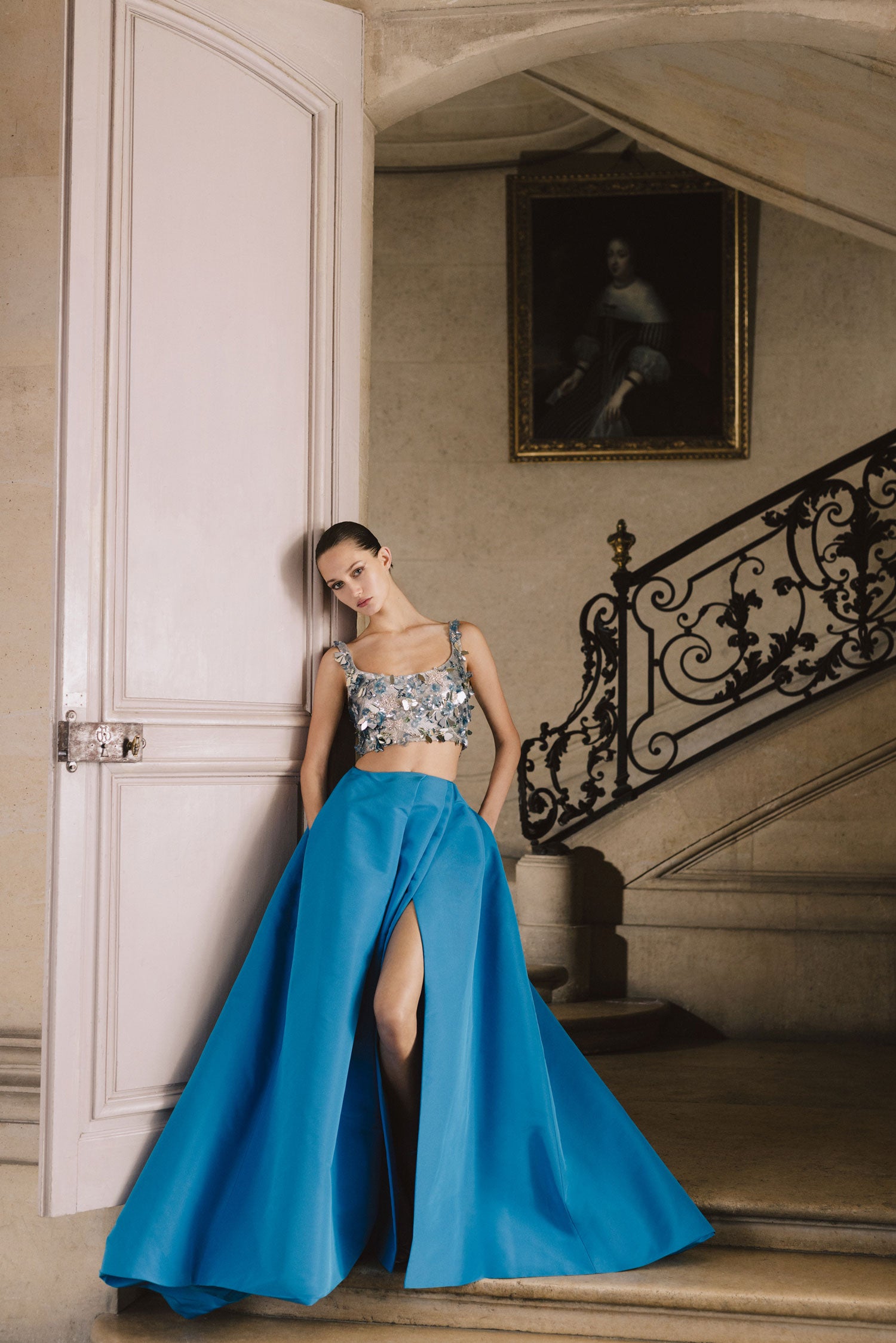 Monique Lhuillier cobalt blue silk faille ballgown skirt with pockets and high slit.  Shown with a silver embroidered crop top.