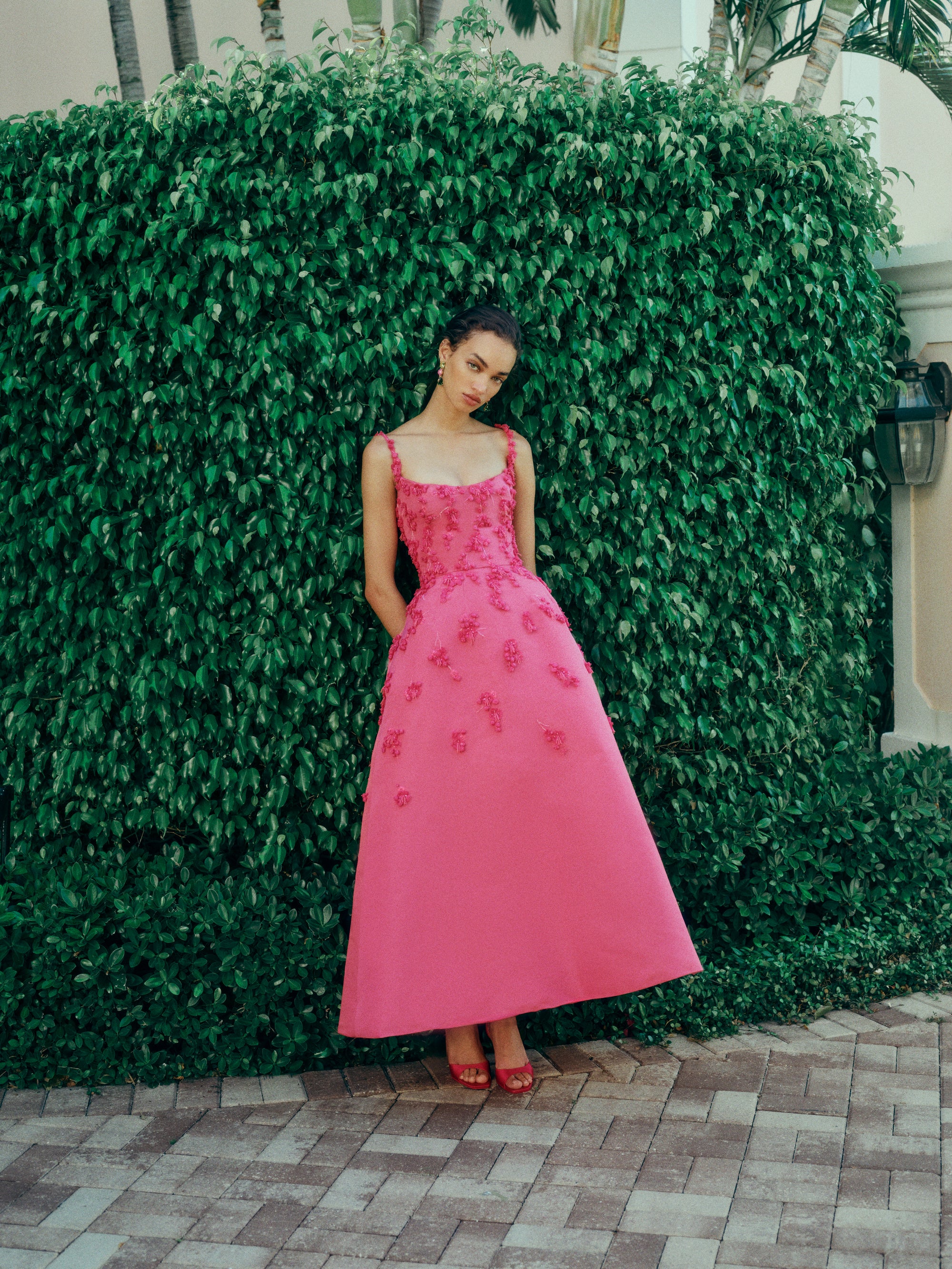 Monique Lhuillier Spring 2025 Tea-length dress with scoop neckline and spaghetti straps in Hibiscus floral embroidered faille fabric - lookbook.