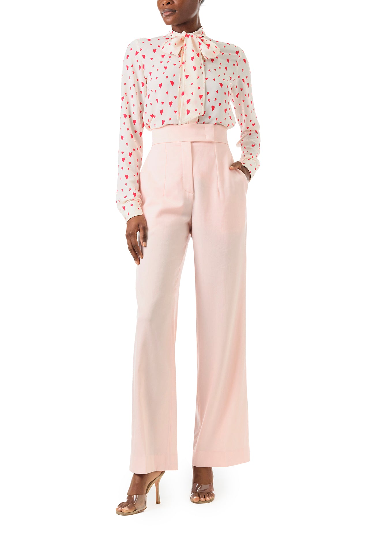 Monique Lhuillier Fall 2024 long sleeve, bow tie blouse in Heart Printed Georgette - front.