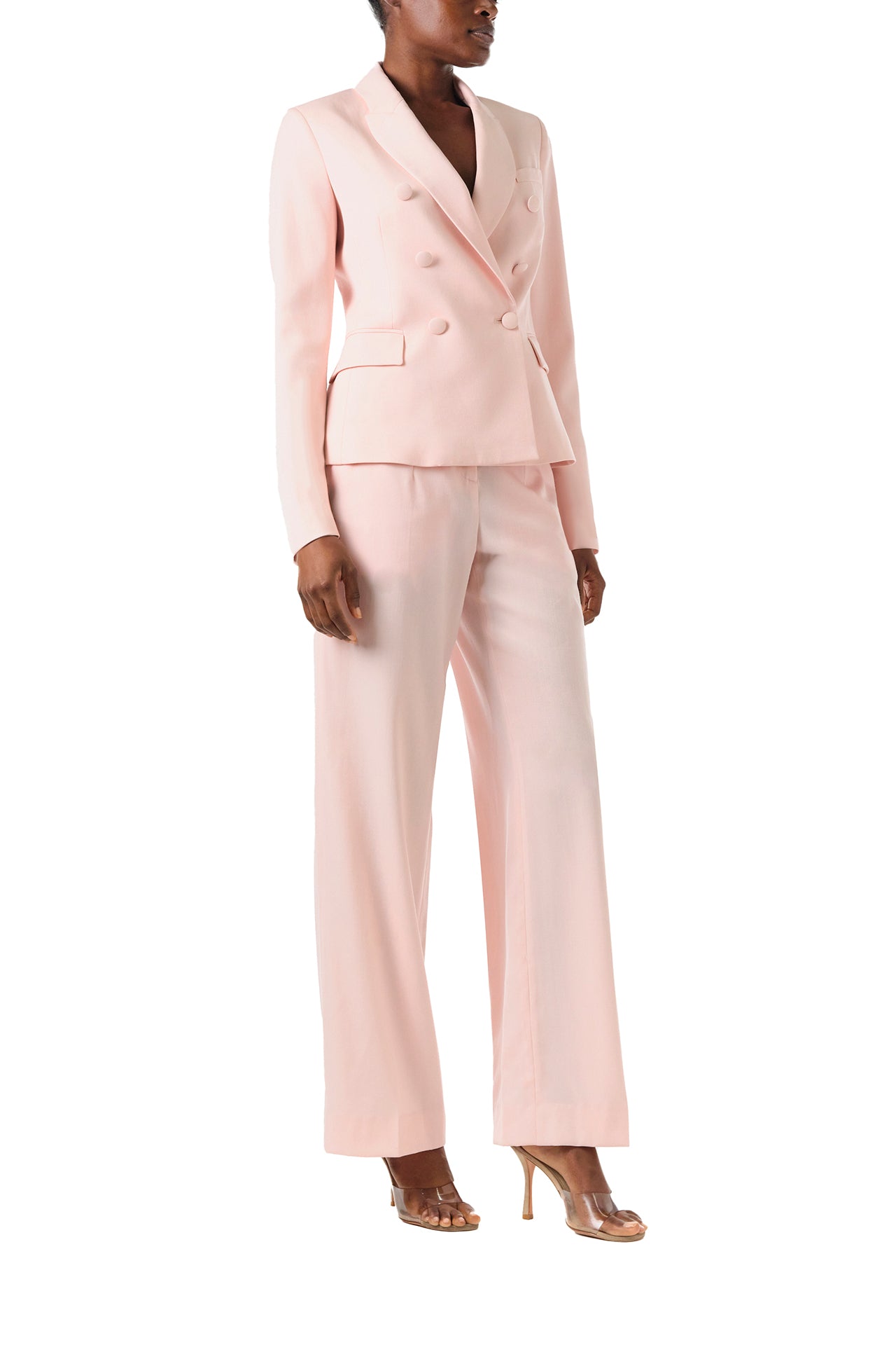 Monique Lhuillier Fall 2024 pale blush wool, double breasted wool blazer with full length sleeve - right side.