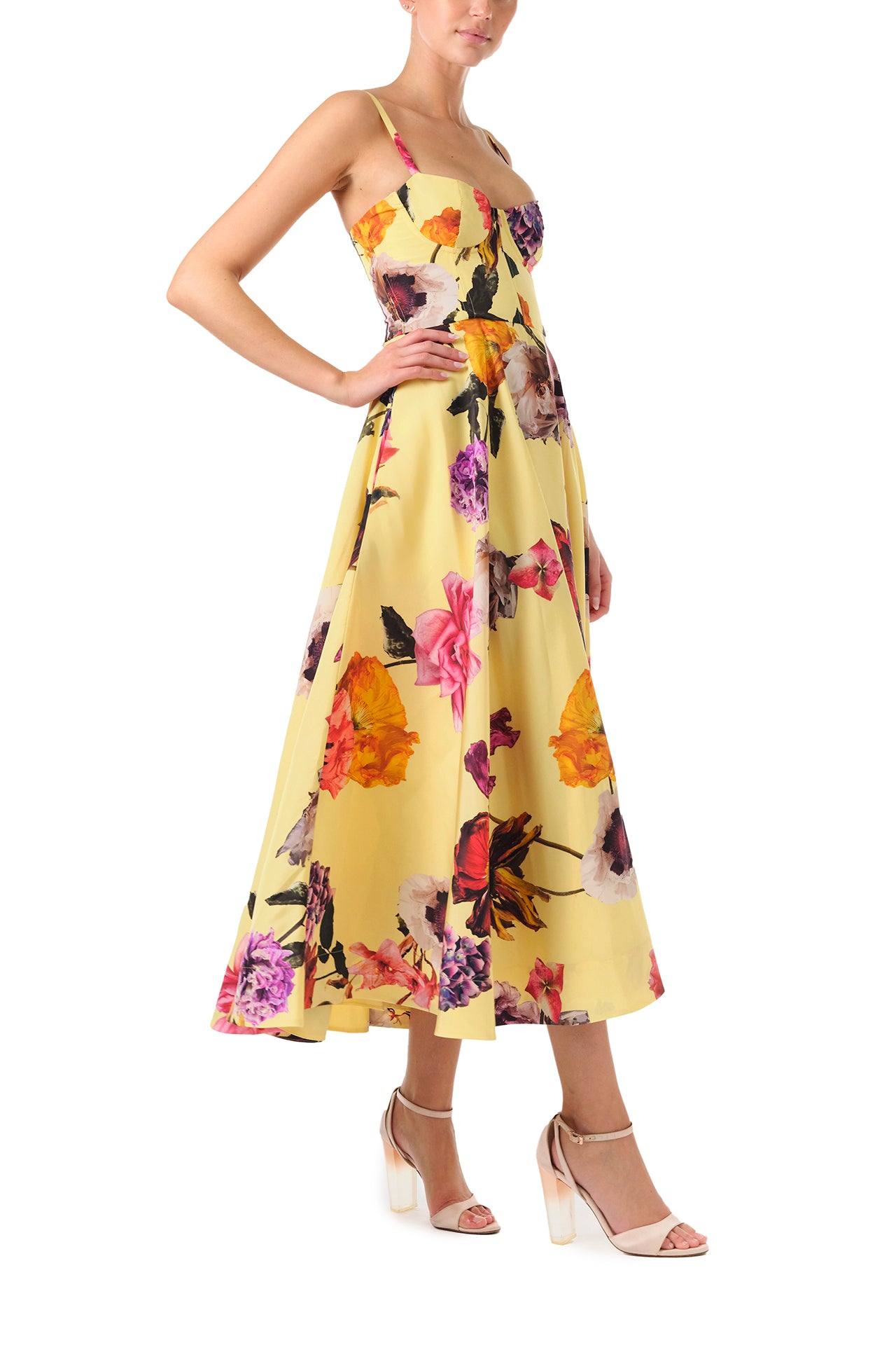 Monique Lhuillier Fall 2024 spaghetti strap, A-line cocktail dress with corseted bodice in yellow floral printed silk faille - right side.