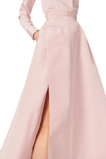 Monique Lhuillier Fall 2024 Full ball skirt with high leg slit and pockets in Pale Blush faille fabric - leg slit.