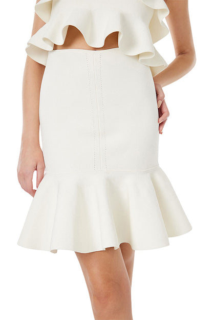 Monique Lhuillier white ruffle mini skirt in stretch fabric.