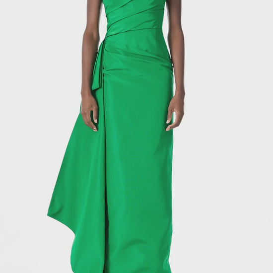 Monique Lhuillier Spring 2025 Strapless column gown with asymmetric draped neckline and sweeping side train in grass green faille fabric - video.