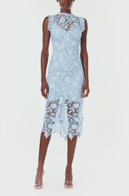 Monique Lhuillier Spring 2024 midi dress in pale blue lace with scalloped edging details.