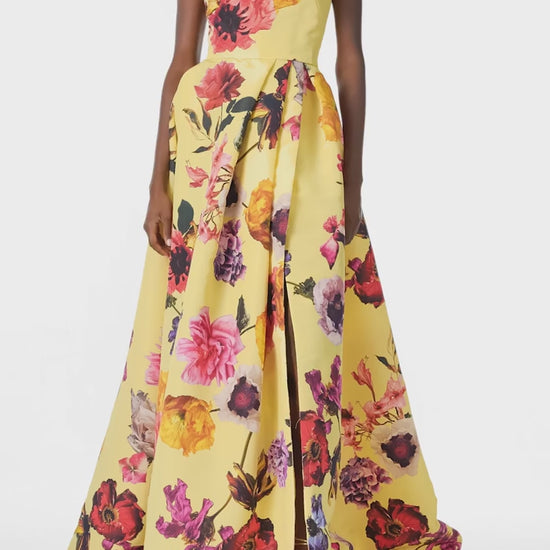 Monique Lhuillier Fall 2024 strapless ball gown with pleated waist and high side slit in soleil floral fabric - video.