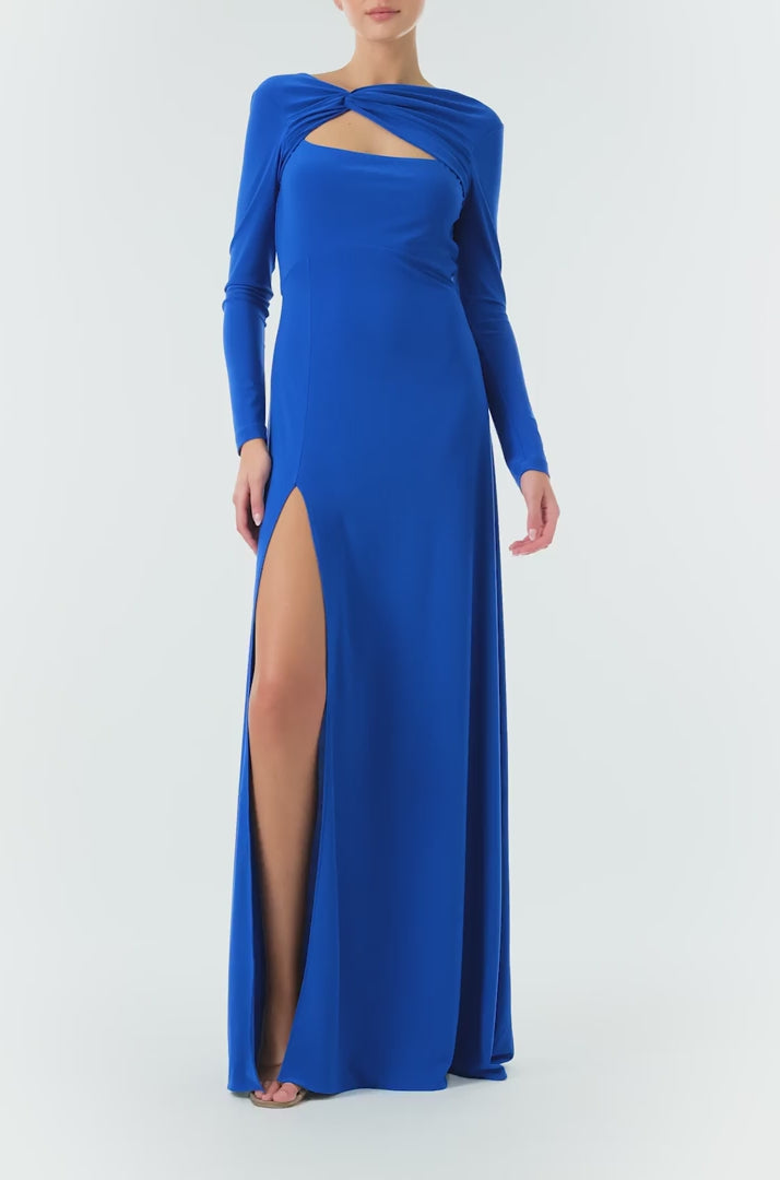 Monique Lhuillier Fall 2024 long sleeve, cobalt jersey gown with knotted keyhole neckline, low v-back and high skirt slit - video.