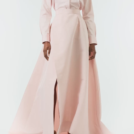 Monique Lhuillier Fall 2024 Full ball skirt with high leg slit and pockets in Pale Blush faille fabric - video.