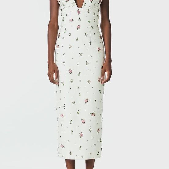 Monique Lhuillier Spring 2025 Floral embroidered silk white linen cocktail dress with deep V-neckline - video.