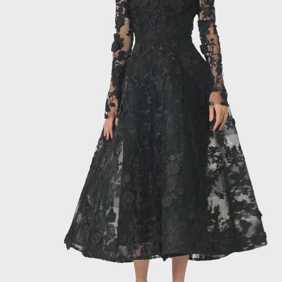 Monique Lhuillier Fall 2024 high neck, long sleeve noir lace jacket with hook and eye closure - video.