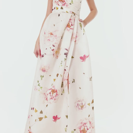 Monique Lhuillier strapless gown with sweetheart neckline and high leg slit in silk white floral gazar.