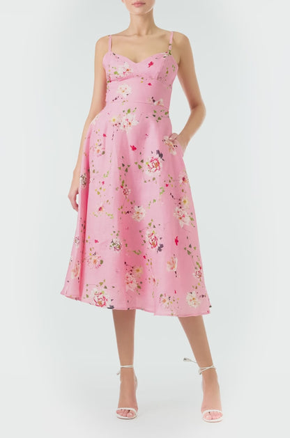 Monique Lhuillier Spring 2024 pink floral print linen cocktail dress with sweetheart neckline, flared skirt and pockets - video.