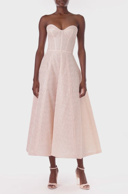 Monique Lhuillier midi length, strapless cocktail dress in powder pink embroidery.