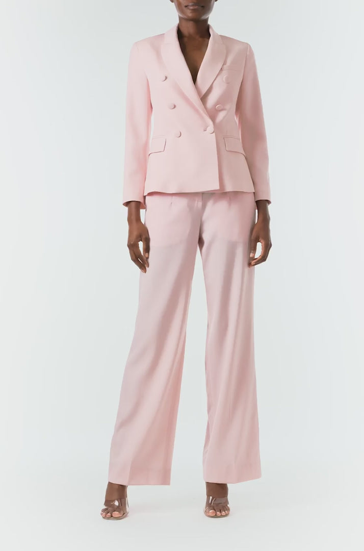 Monique Lhuillier Fall 2024 pale blush wool, double breasted wool blazer with full length sleeve - video.