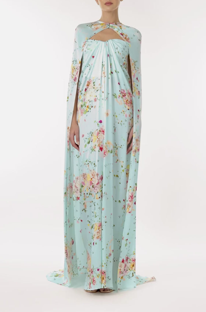 Monique Lhuillier strapless draped gown and cape in pistachio floral print fabric.