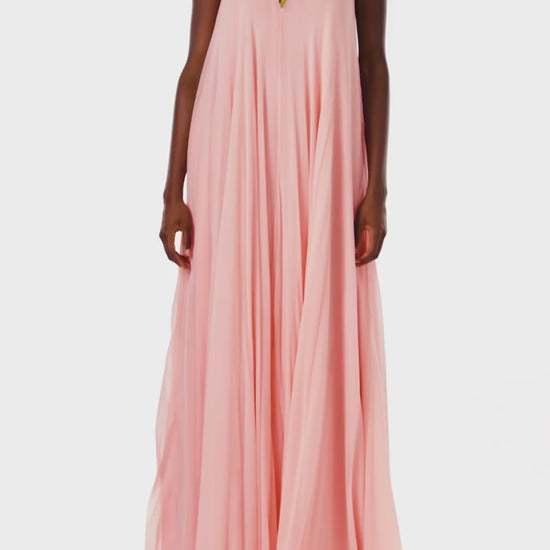 Monique Lhuillier Spring 2024 Melon chiffon caftan gown with floral 3-D embroidery over an illusion tulle neckline - video.