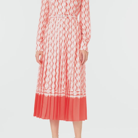 Monique Lhuillier Spring 2025 Long sleeve pleated button-down midi dress with collared neckline and belt at waist in Rosette colored Geo printed georgette fabric - video.