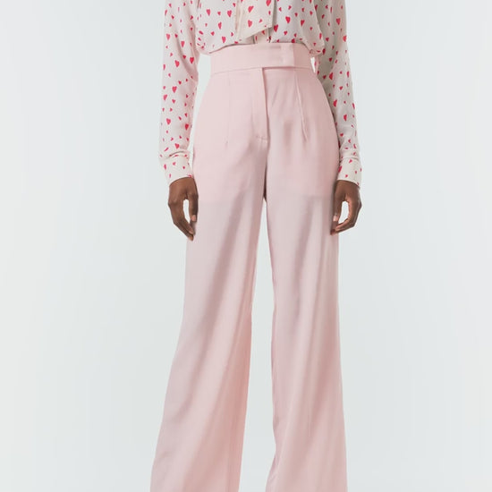 Monique Lhuillier Fall 2024 long sleeve, bow tie blouse in Heart Printed Georgette - video.