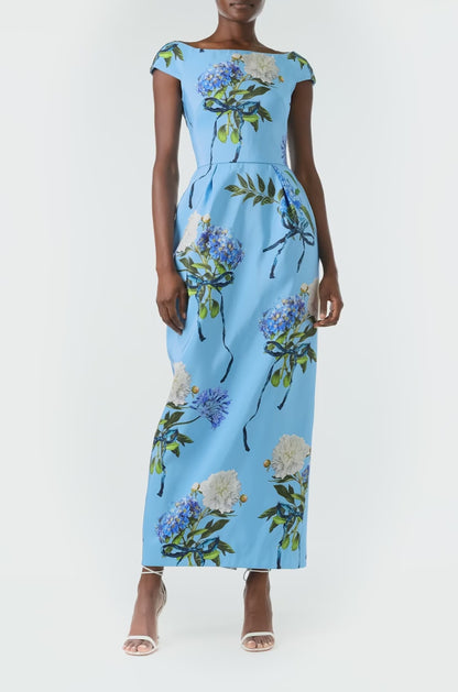 Monique Lhuillier Spring 2024 column gown with bateau neckline, cap sleeves and pockets in Sky Blue Hydrangea printed silk faille - video.