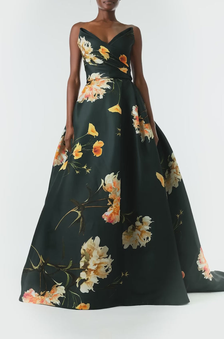 Monique Lhuillier Fall 2024 Strapless, V-neck ballgown with draped bodice, full skirt and pockets in Juniper Floral Print Gazar - video.