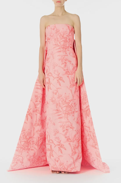 Monique Lhuillier Spring 2025 Strapless, column gown with sweeping integral train in rosette/coral colored Floral Toile Printed Faille - video.