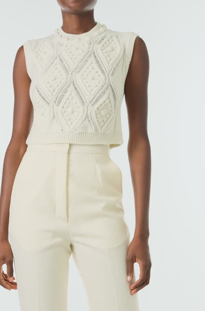 Monique Lhuillier Fall 2024 sleeveless, bobble crop tank in Creme wool cable knit - video.