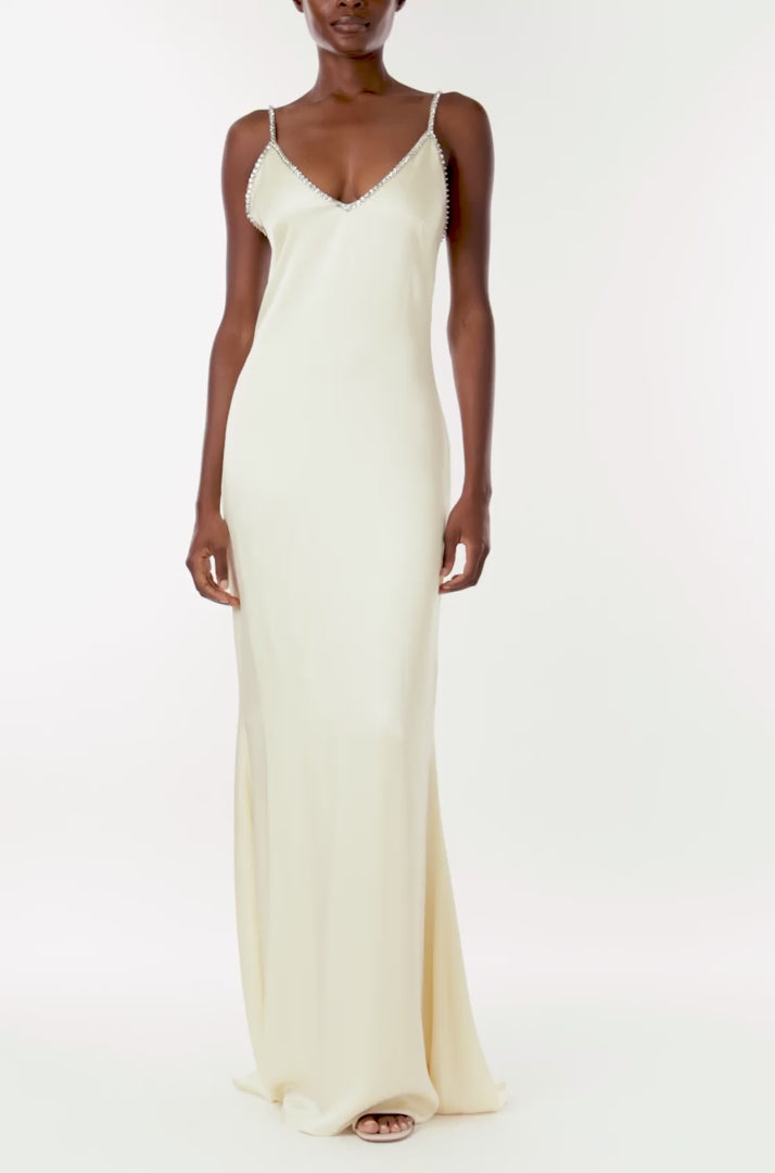 Monique Lhuillier creme satin slip gown with crystal embroidered straps and neckline.