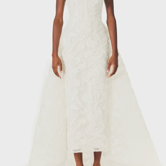 Monique Lhuillier Silk White strapless, embroidered tea-length column gown with floor-length dramatic train - video.