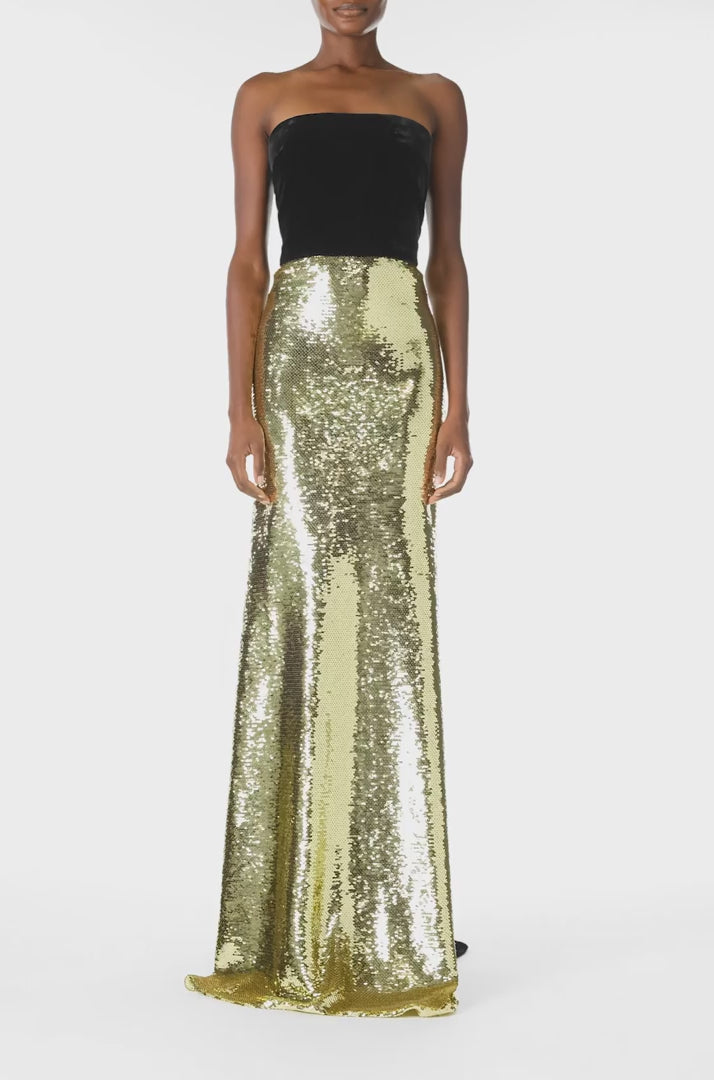 Monique Lhuillier Fall 2024 strapless sequin evening gown in gold sequins with noir velvet bodice and train - video.