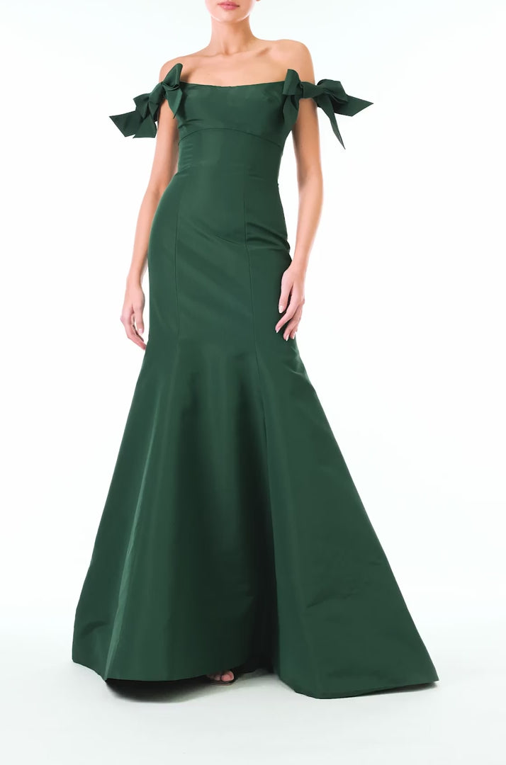 Monique Lhuillier Fall 2024 off the shoulder gown with trumpet skirt and bow sleeves in Juniper green faille fabric - video.