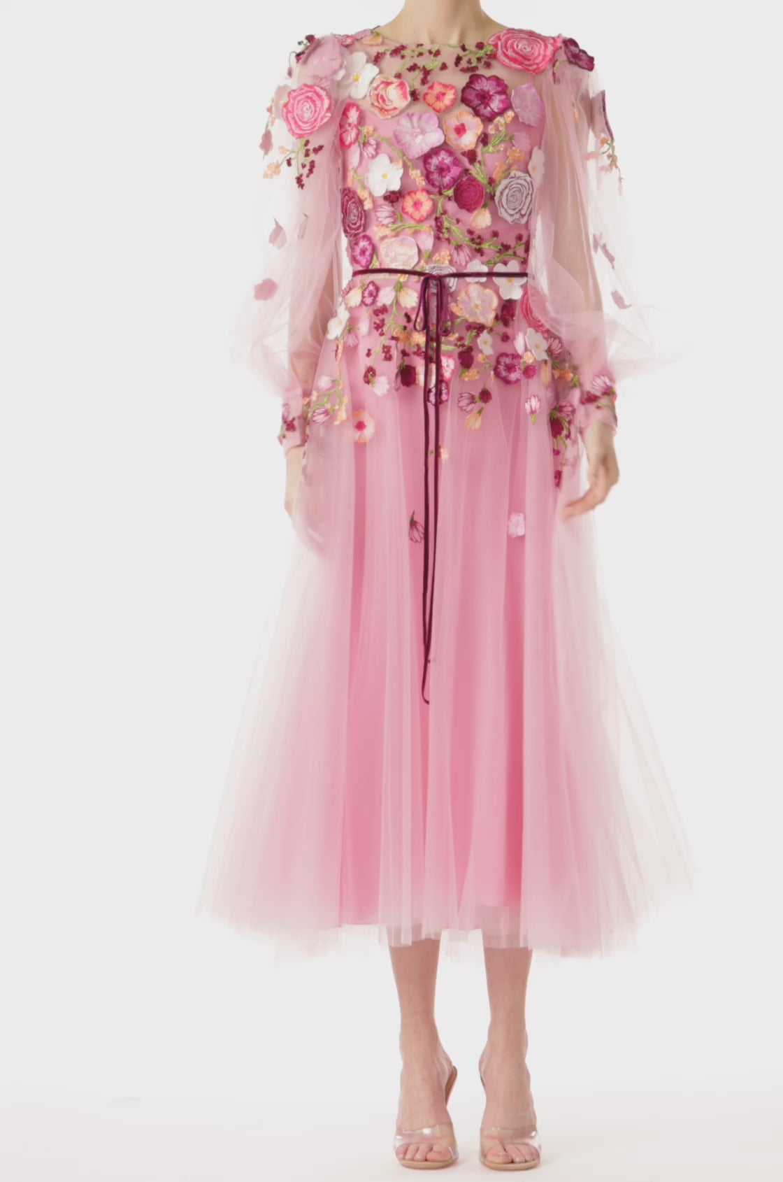 Monique Lhuillier jewel neck midi dress with sheer long sleeves in pink tulle and 3d floral embroidery.