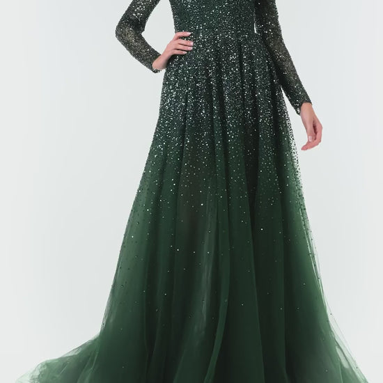 Monique Lhuillier Fall 2024 Juniper green embroidered tulle gown with long sleeves and off the shoulder neckline - video.