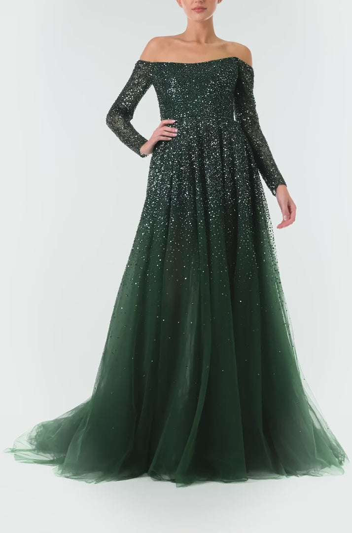 Monique Lhuillier Fall 2024 Juniper green embroidered tulle gown with long sleeves and off the shoulder neckline - video.