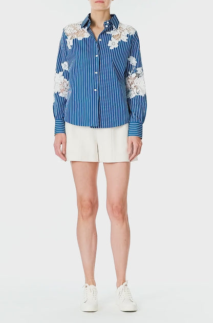 Monique Lhuillier Spring 2025 Long sleeve, button front collared striped shirt with lace detailing in Nautical Blue poplin with White lace details  - video.