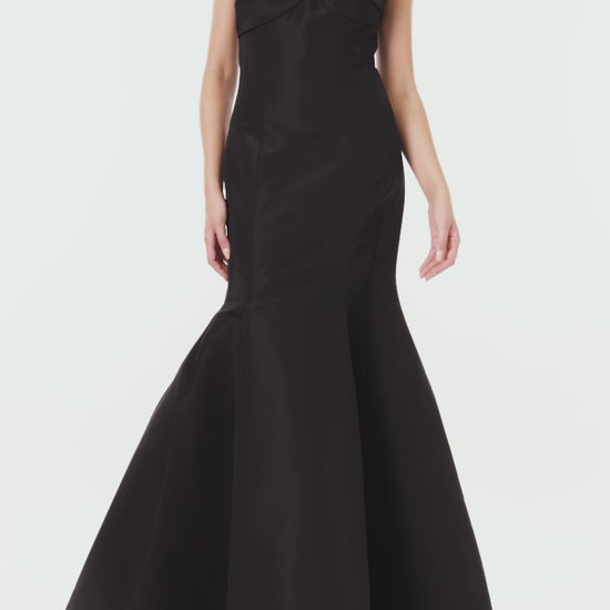 Monique Lhuillier black silk faille strapless gown with mermaid skirt.