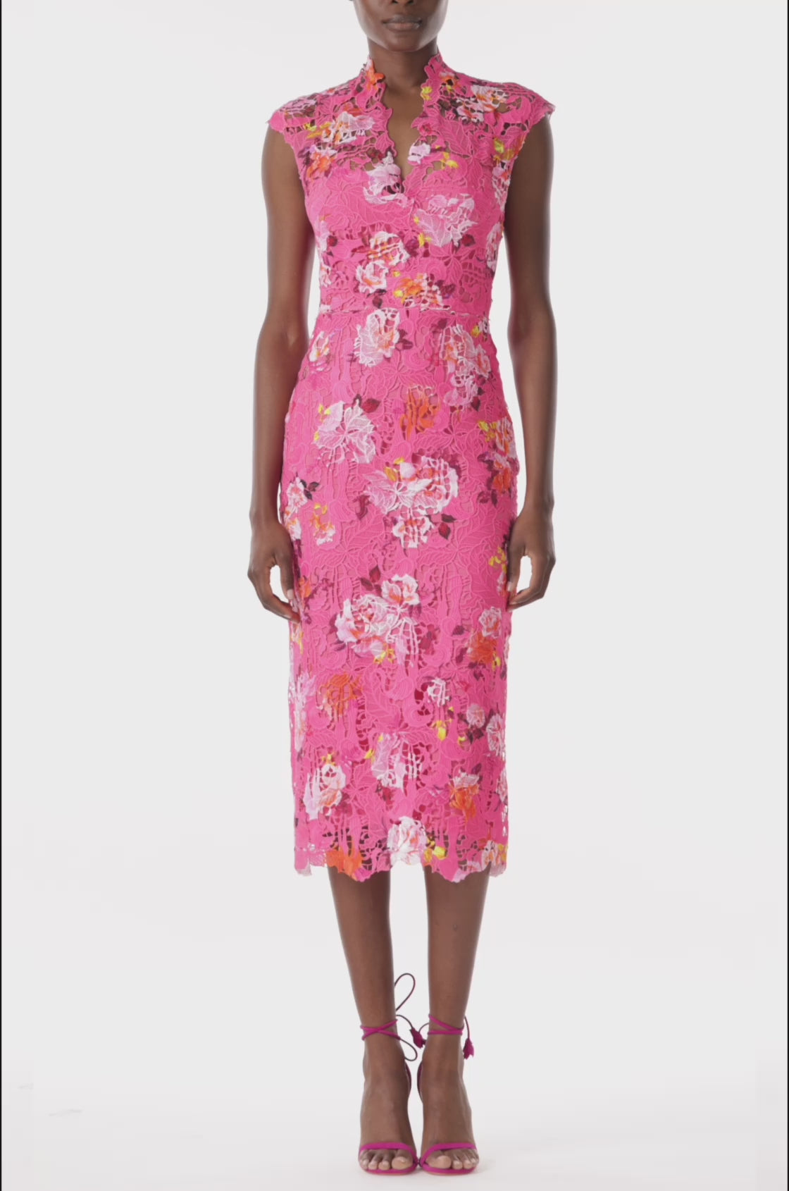 Monique Lhuillier fuchsia printed lace dress with v-neck and midi-length.