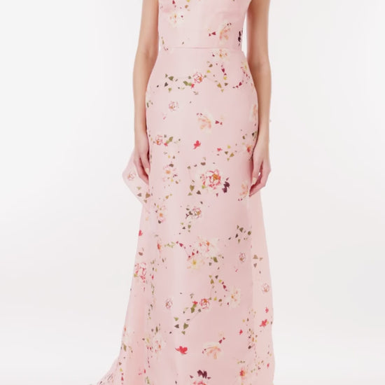 Monique Lhuillier strapless column gown in pink peony flora gazar fabric with tufted bustle train.