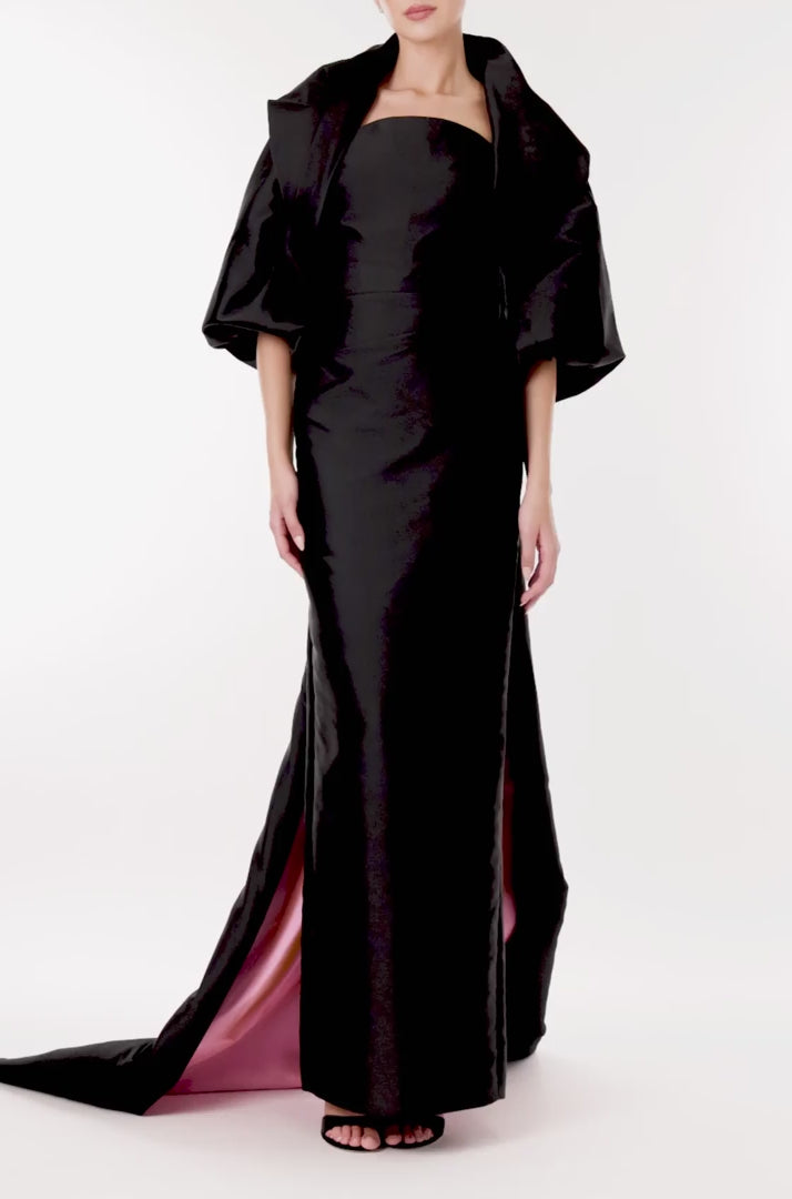 Monique Lhuillier draped cocoon evening jacket in black faille shown with the strapless column gown in black and pink.