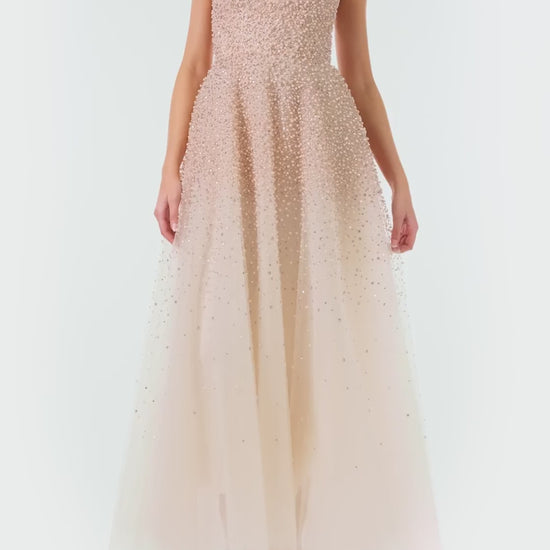 Monique Lhuillier Fall 2024 strapless, A-line tulle gown in Pale Blush with cascading pearl embroidery - video.