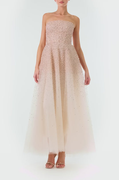 Monique Lhuillier Fall 2024 strapless, A-line tulle gown in Pale Blush with cascading pearl embroidery - video.