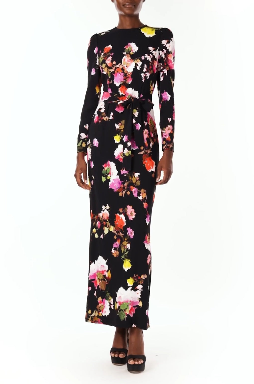 Monique Lhuillier Spring 2024 long sleeve, jewel neck floral print gown with self-tie belt at waist. - video.