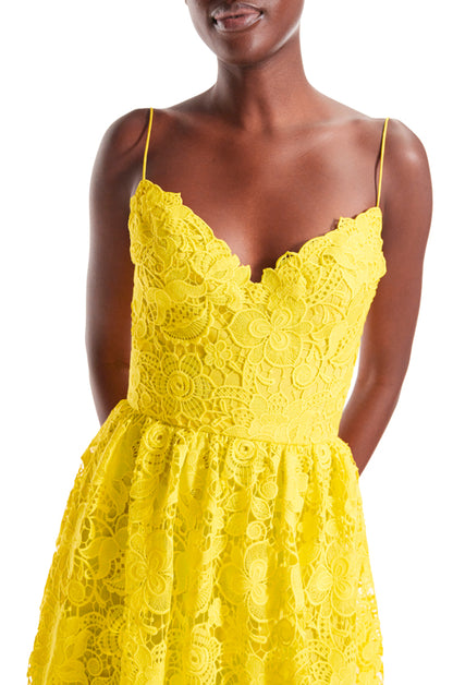 Monique Lhuillier yellow guipure lace tea length dress.