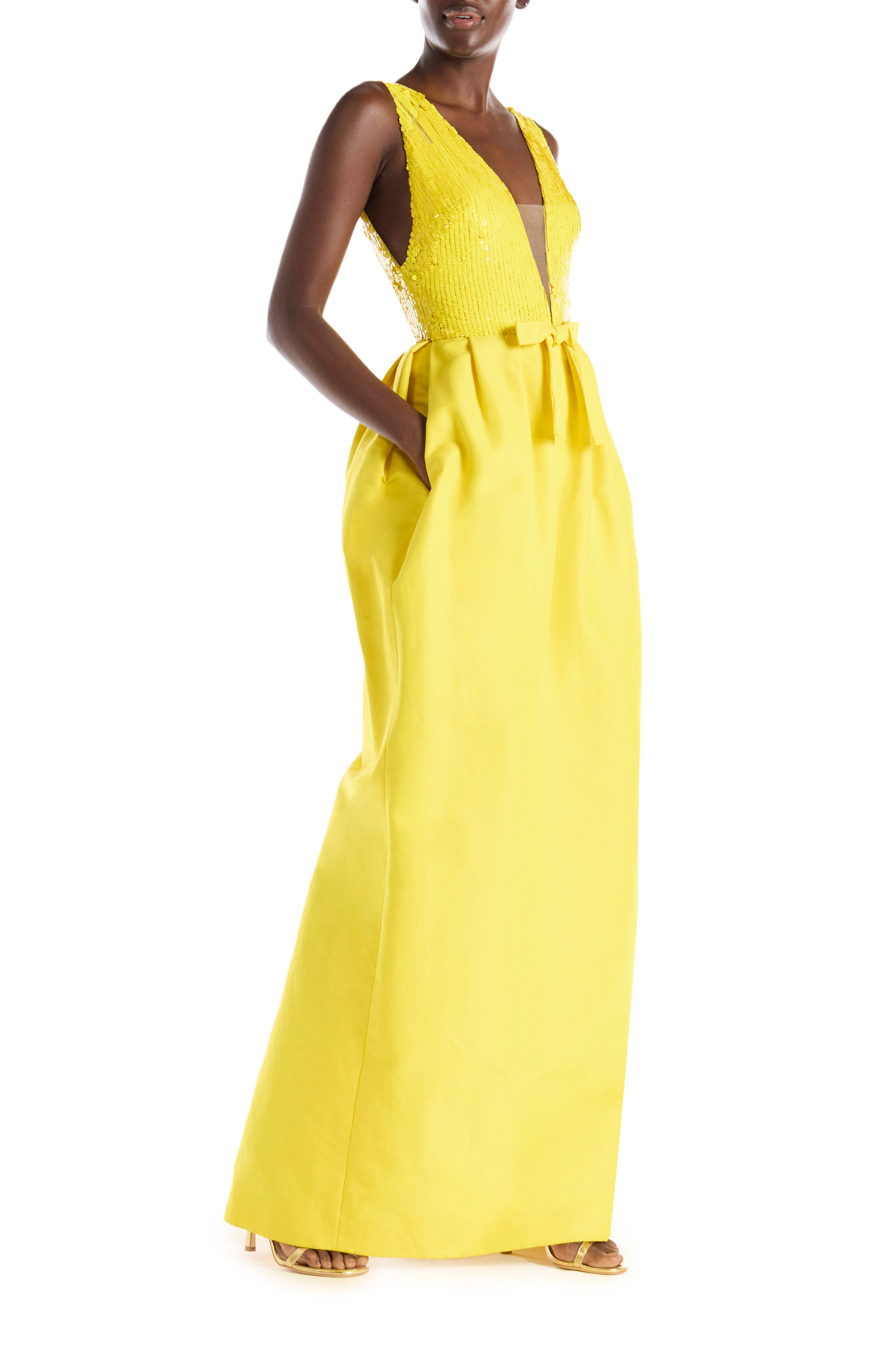 Yellow silk faille floor length gown with sequin bodice and illusion neckline.